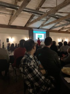 Joel presenting at the banquet