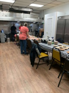 We also had some amazing volunteers in the kitchen and serving food!