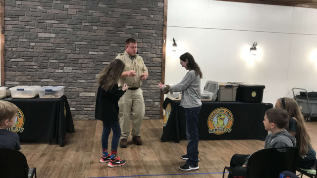 Kylie holding a snake