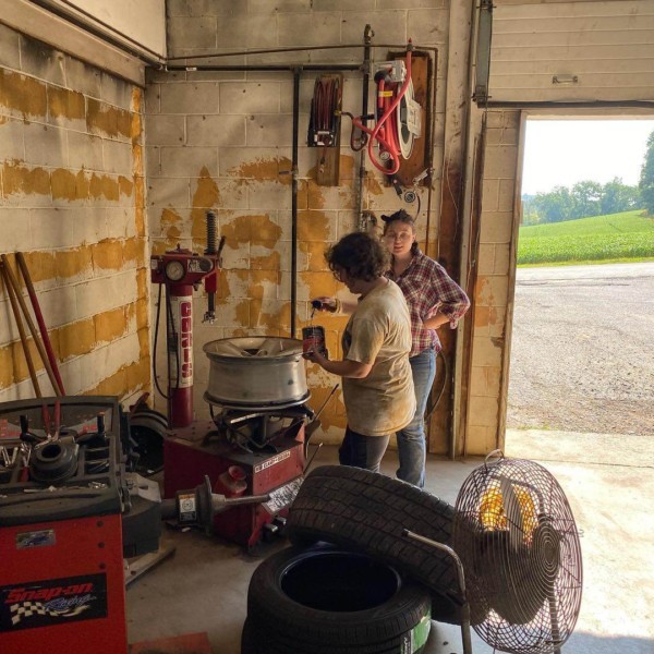 Emi & Grace are in the mechanic shop