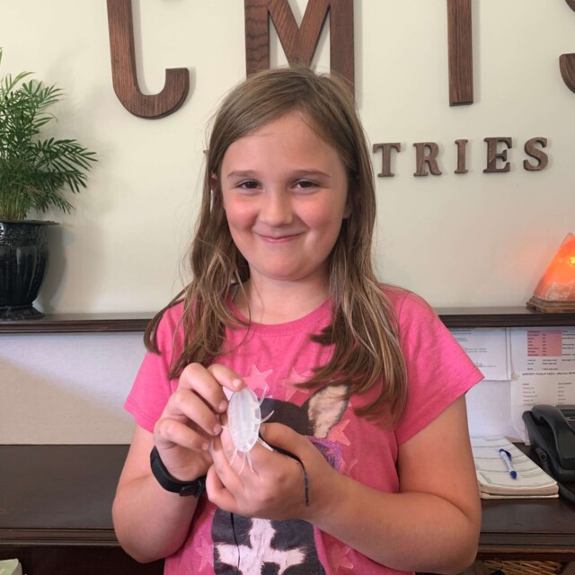 Parker was a little too proud of her glow-in-the-dark fake cockroach...