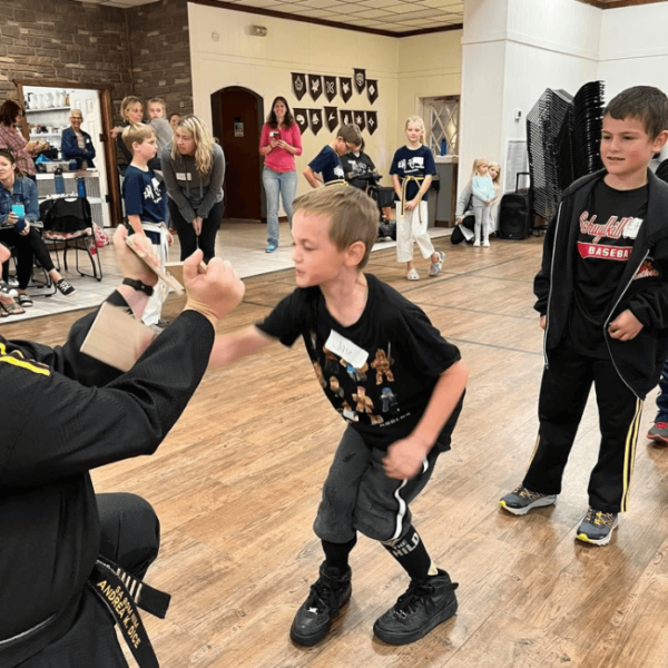 Jase breaking a board