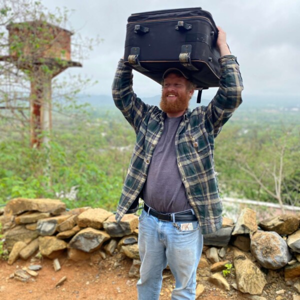 Justin was weirdly proud about holding the suitcase on his head??